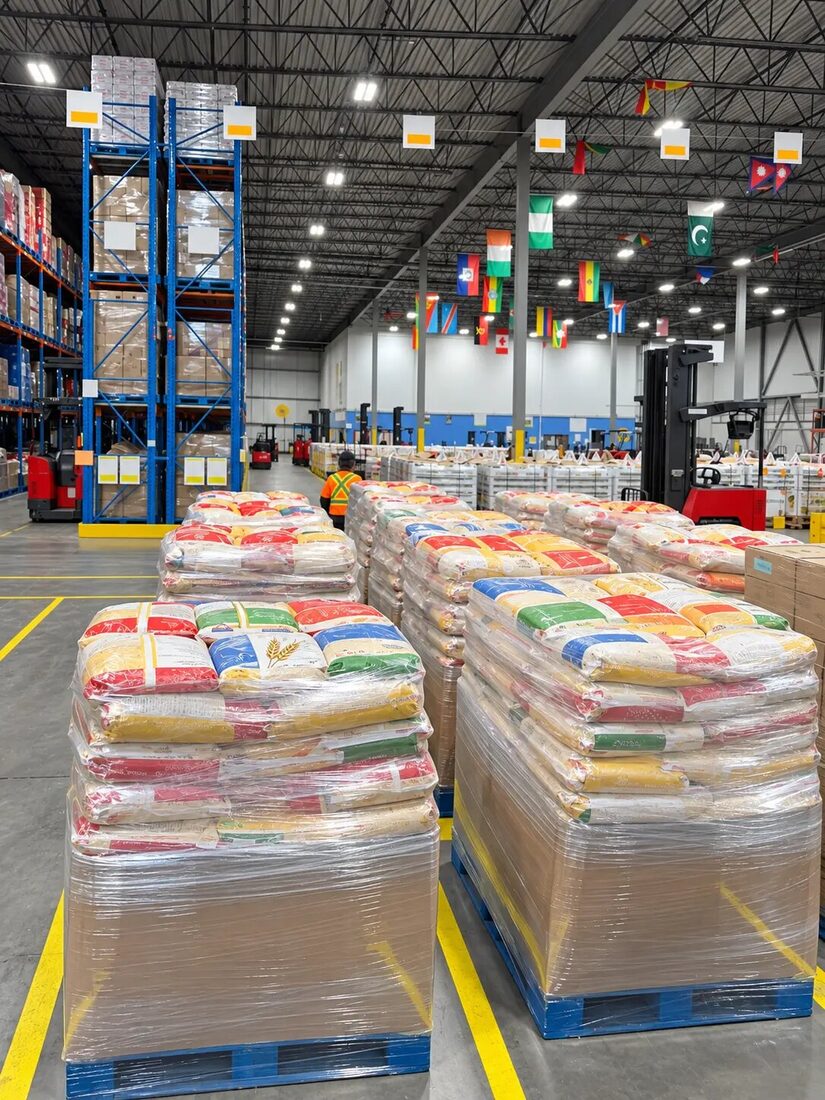Retail-ready mixed flour pallets completed by an Express Lumpers Alberta team