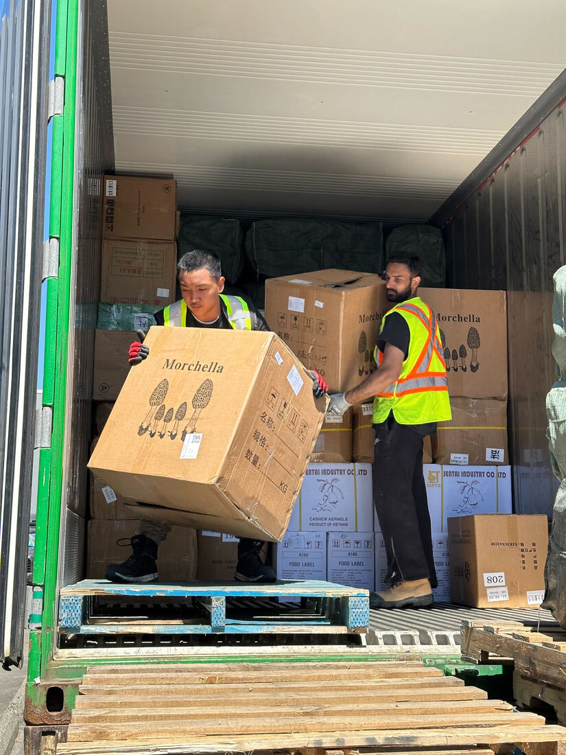Express Lumpers crew handling freight during a BC container program