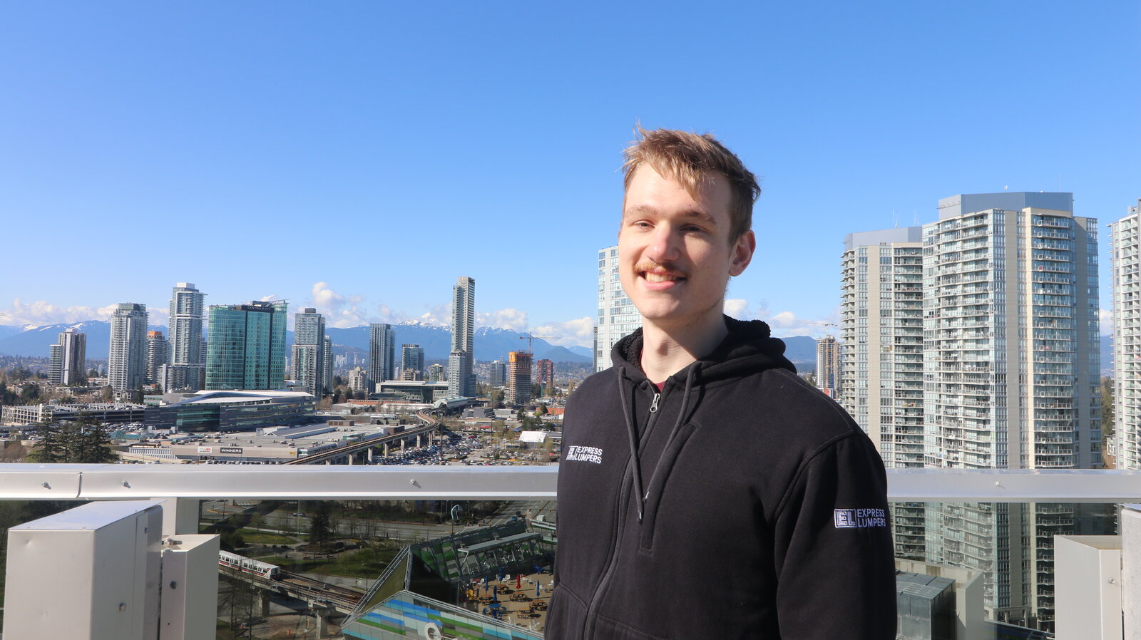 Express Lumpers team member overlooking the Surrey, BC skyline
