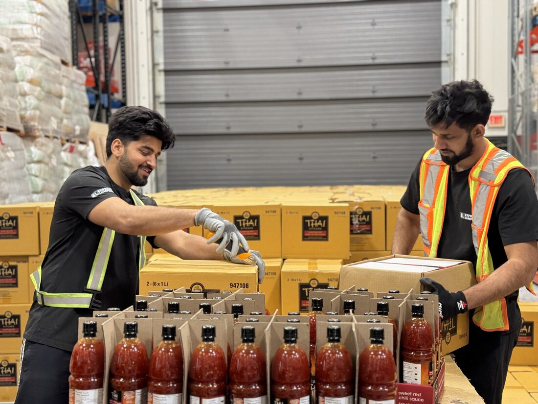 Express Lumpers crew repackaging product at a Surrey facility